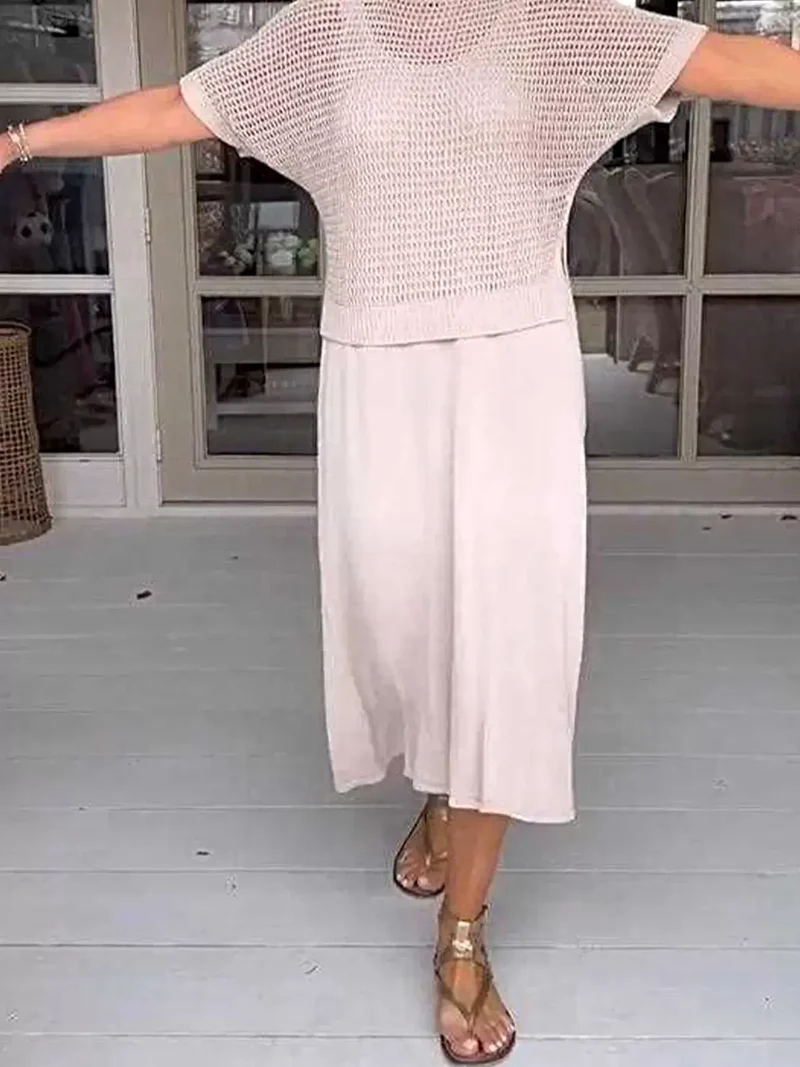 Plus size 2-delige set bestaande uit een opgemaakt gebreid vestje en jurk met oversized pasvorm.