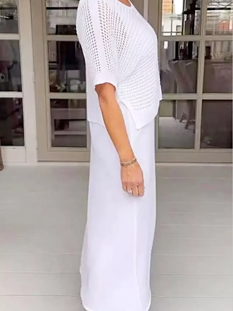 Plus size 2-delige set bestaande uit een opgemaakt gebreid vestje en jurk met oversized pasvorm.