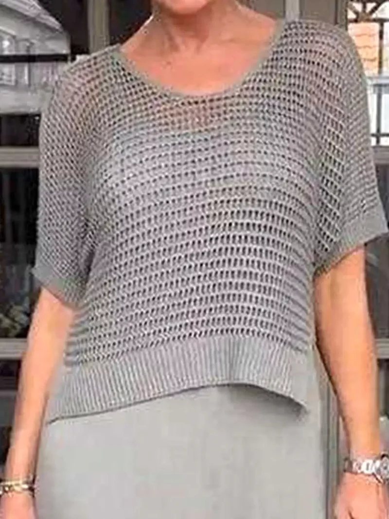 Plus size 2-delige set bestaande uit een opgemaakt gebreid vestje en jurk met oversized pasvorm.