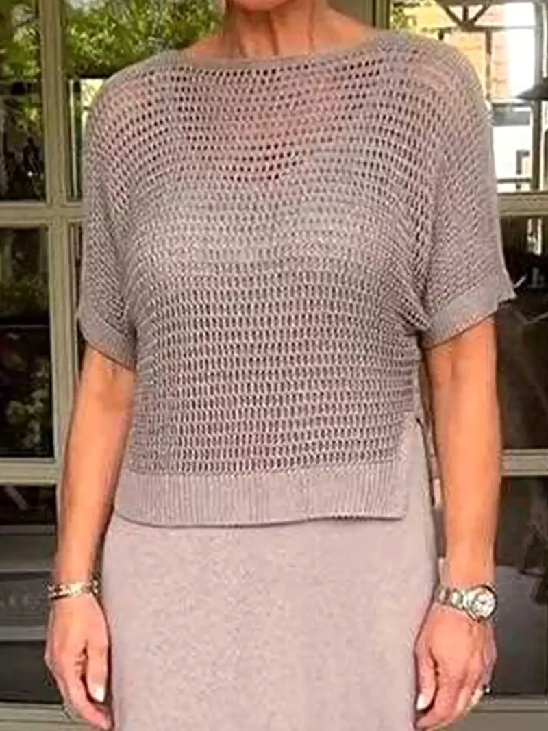 Plus size 2-delige set bestaande uit een opgemaakt gebreid vestje en jurk met oversized pasvorm.