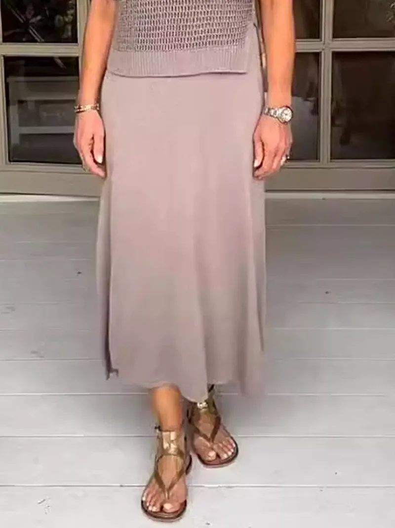 Plus size 2-delige set bestaande uit een opgemaakt gebreid vestje en jurk met oversized pasvorm.