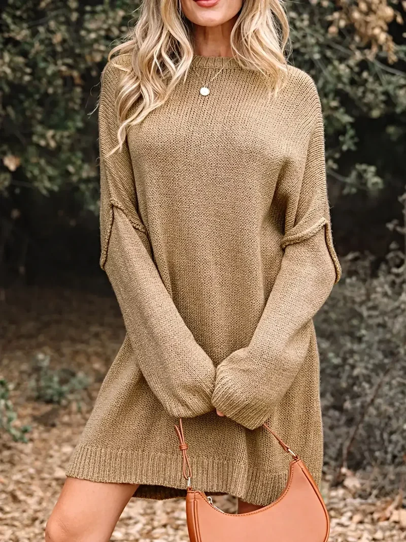 Oversized sweaterjurk - losvallend gebreid ontwerp met verlaagde schouders en een relaxte pasvorm.