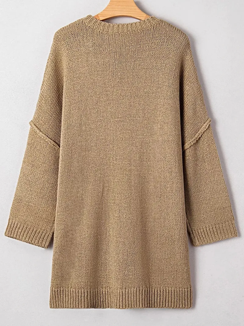 Oversized sweaterjurk - losvallend gebreid ontwerp met verlaagde schouders en een relaxte pasvorm.