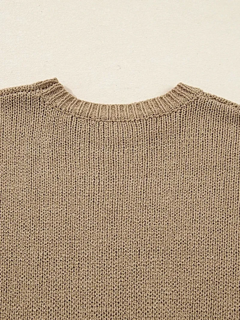 Oversized sweaterjurk - losvallend gebreid ontwerp met verlaagde schouders en een relaxte pasvorm.