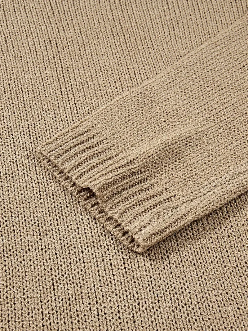 Oversized sweaterjurk - losvallend gebreid ontwerp met verlaagde schouders en een relaxte pasvorm.