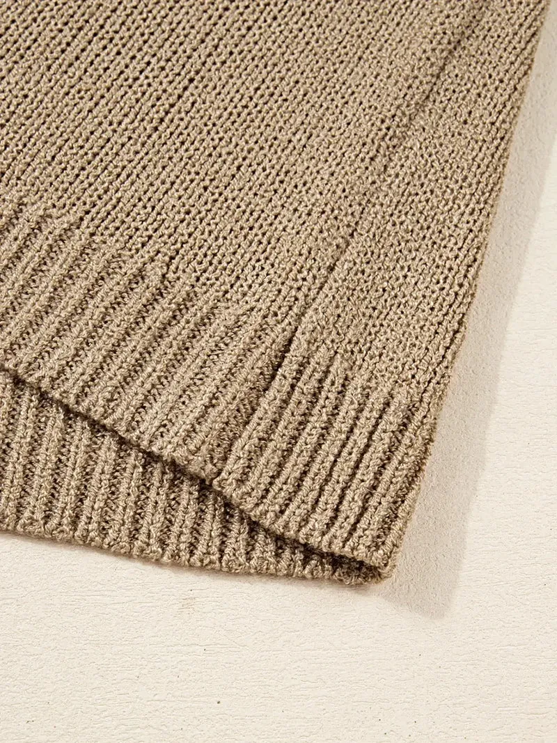 Oversized sweaterjurk - losvallend gebreid ontwerp met verlaagde schouders en een relaxte pasvorm.