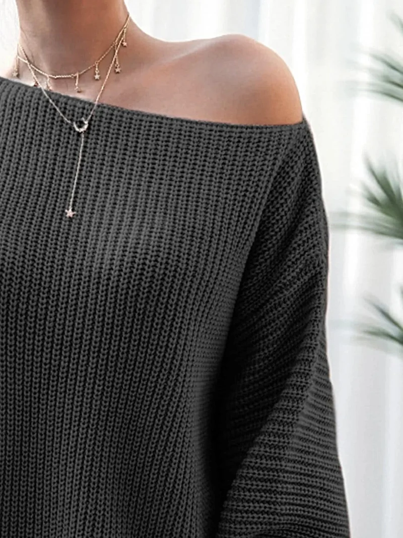 Dames mini-trui-jurk van ribgebreid materiaal met lange mouwen, gemaakt van licht elastisch acrylbreisel.