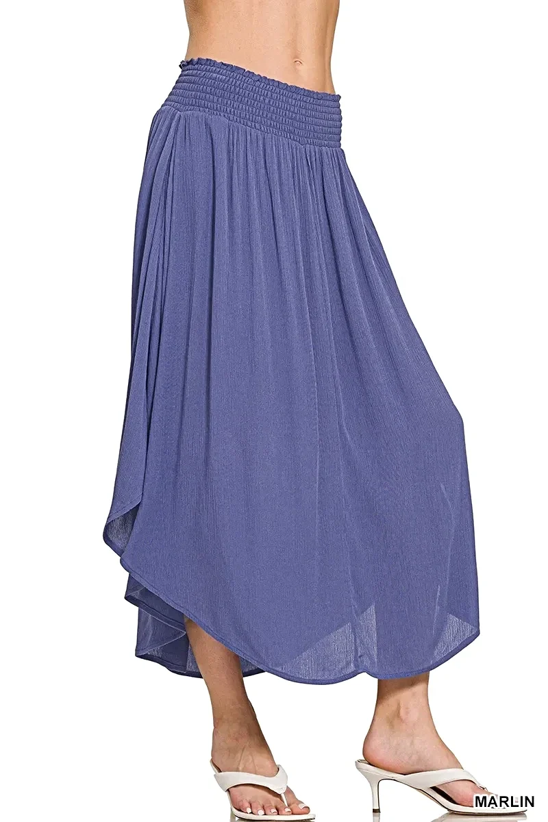 Geweven maxi-rok met kreukeleffect, zakken en een geplooide taille - een moeiteloos stijlvolle essential.