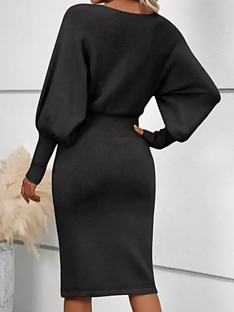 Geribbelde bodycon sweaterjurk met lantaarnmouwen, gemaakt van elastisch breisel en met een elegante midi-lengte.