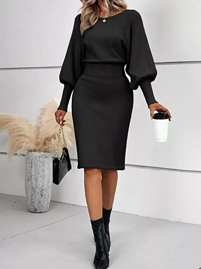 Geribbelde bodycon sweaterjurk met lantaarnmouwen, gemaakt van elastisch breisel en met een elegante midi-lengte.