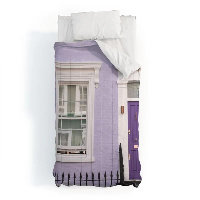 London England I Pastel violet facade and door of a Victorian architecture house in Notting Hill Comforter