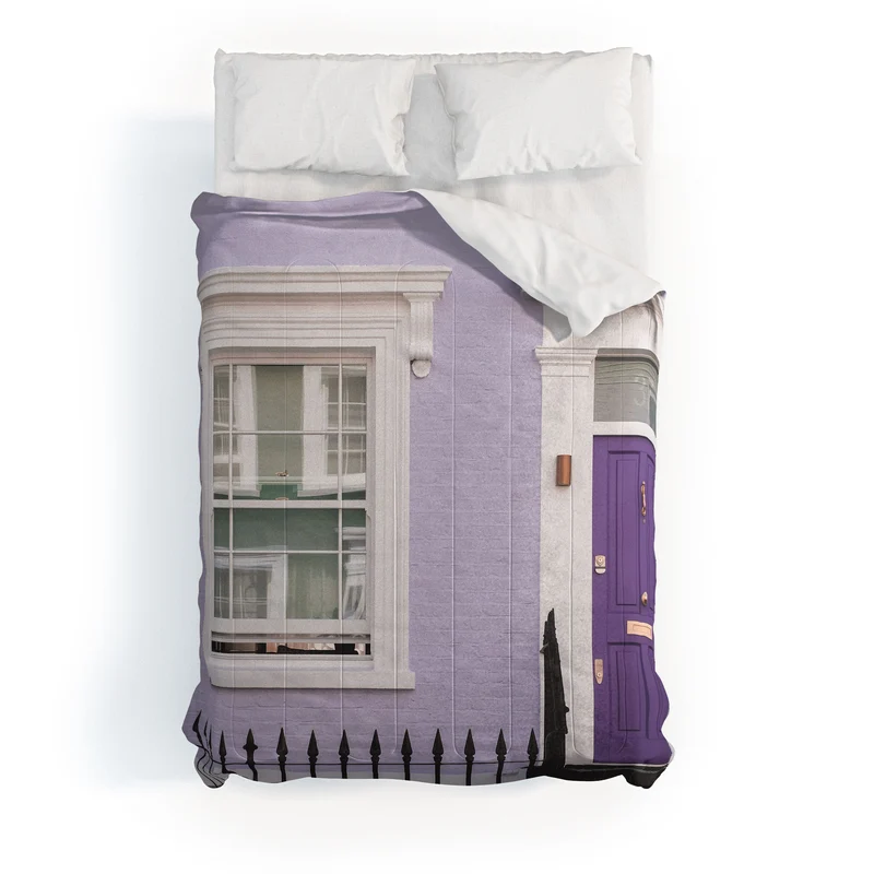 London England I Pastel violet facade and door of a Victorian architecture house in Notting Hill Comforter