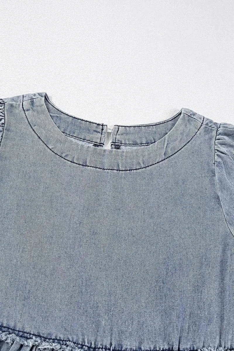 Vintage denim jurk met zakken, open rug en franjes - trendy en klassieke look