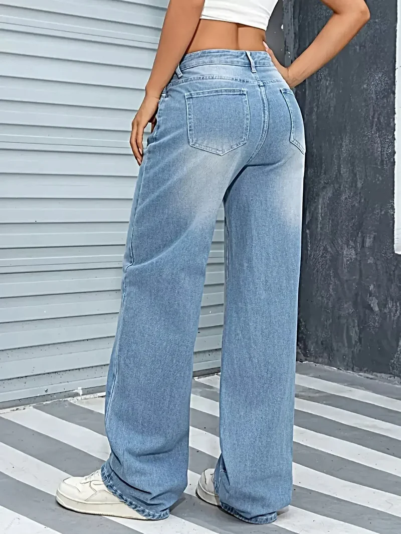 Damesjeans met wijde pijpen, trekkoord in de taille, zakken en een stofmix van 85% katoen.