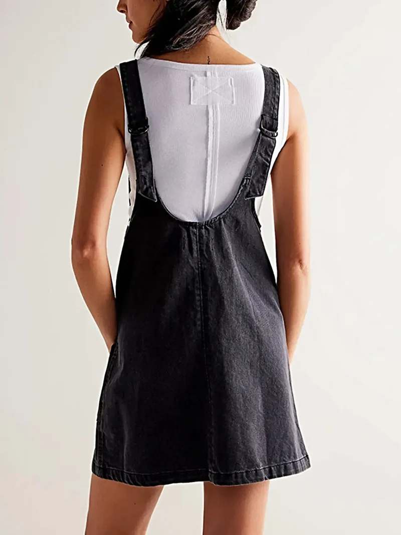 Luxe denim tankjurk met oversized V-hals en voorzakken - perfect voor elke gelegenheid.