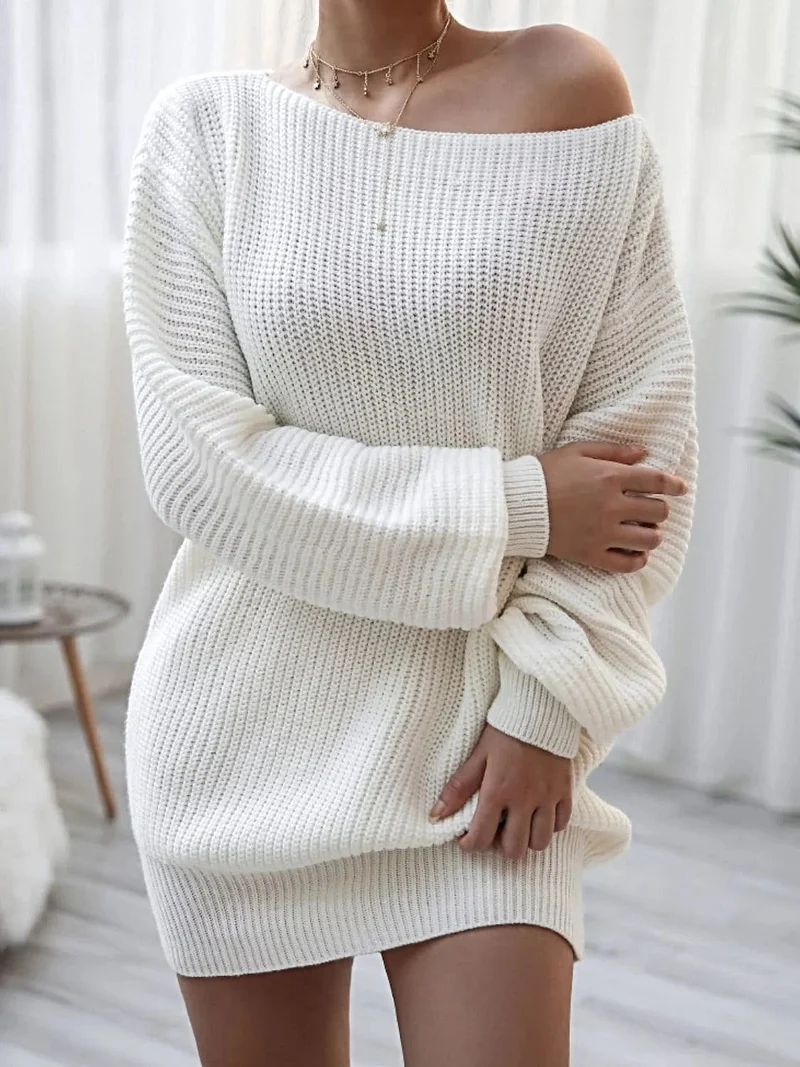 Truijurk met ballonmouwen - Mini gebreide jurk met boothals en een relaxed silhouet