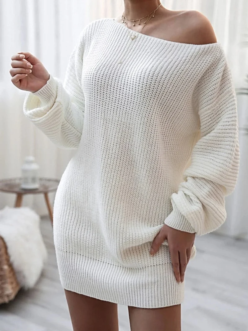 Truijurk met ballonmouwen - Mini gebreide jurk met boothals en een relaxed silhouet