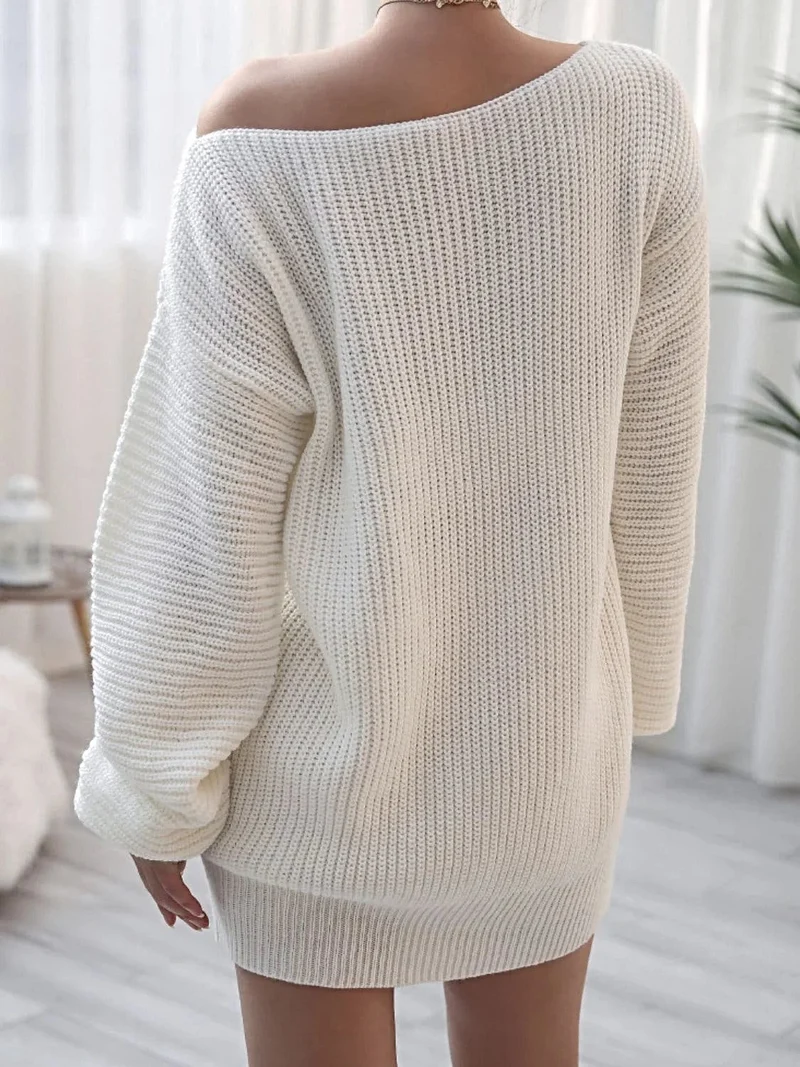 Truijurk met ballonmouwen - Mini gebreide jurk met boothals en een relaxed silhouet