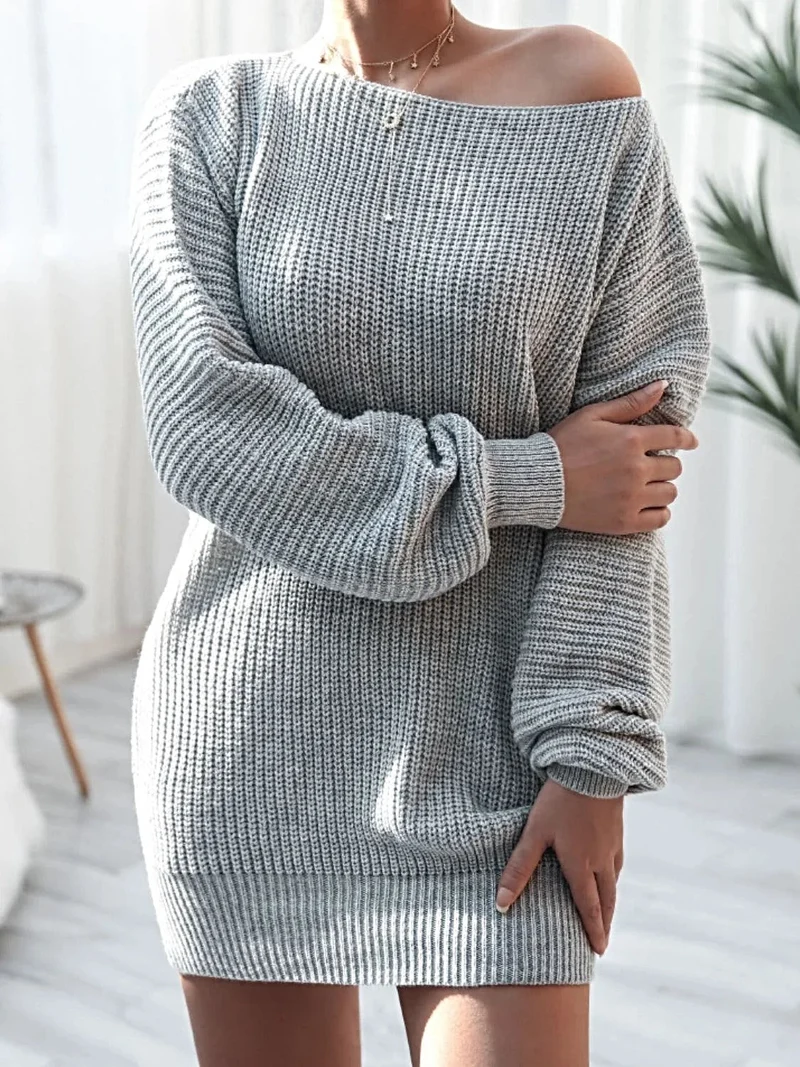 Truijurk met ballonmouwen - Mini gebreide jurk met boothals en een relaxed silhouet