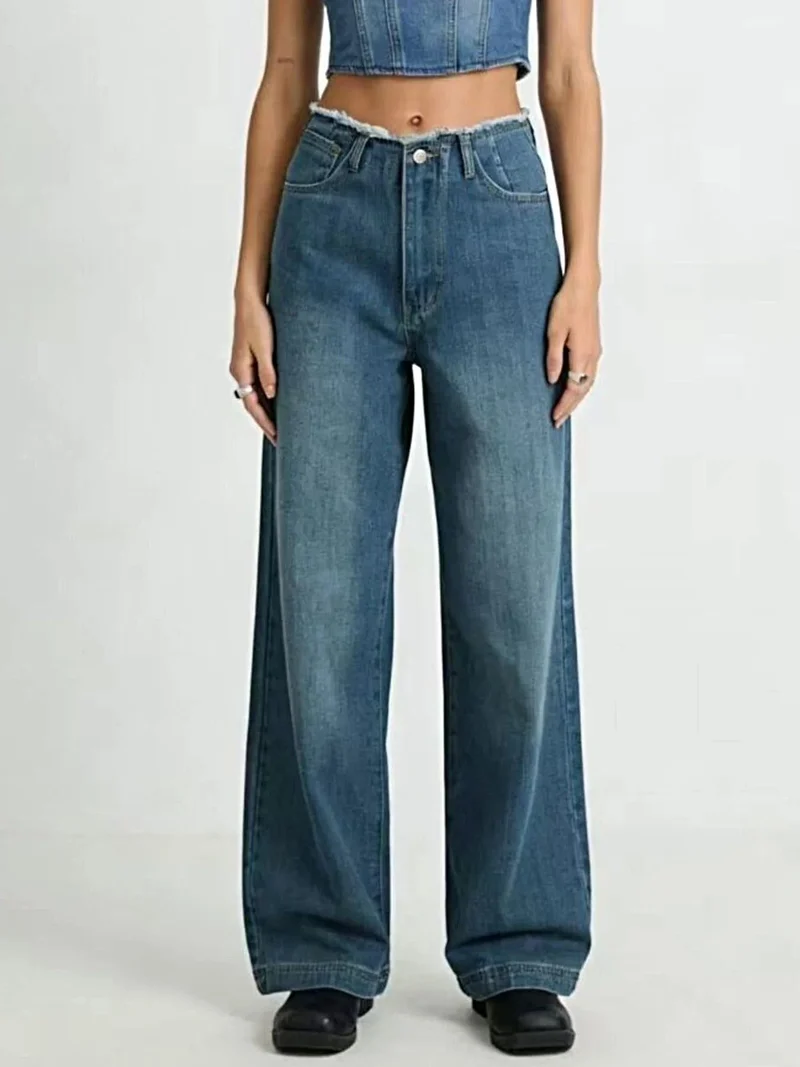 Luxe jeans met gerafelde zoom, knoopdetails en zakken - wijde pijpen