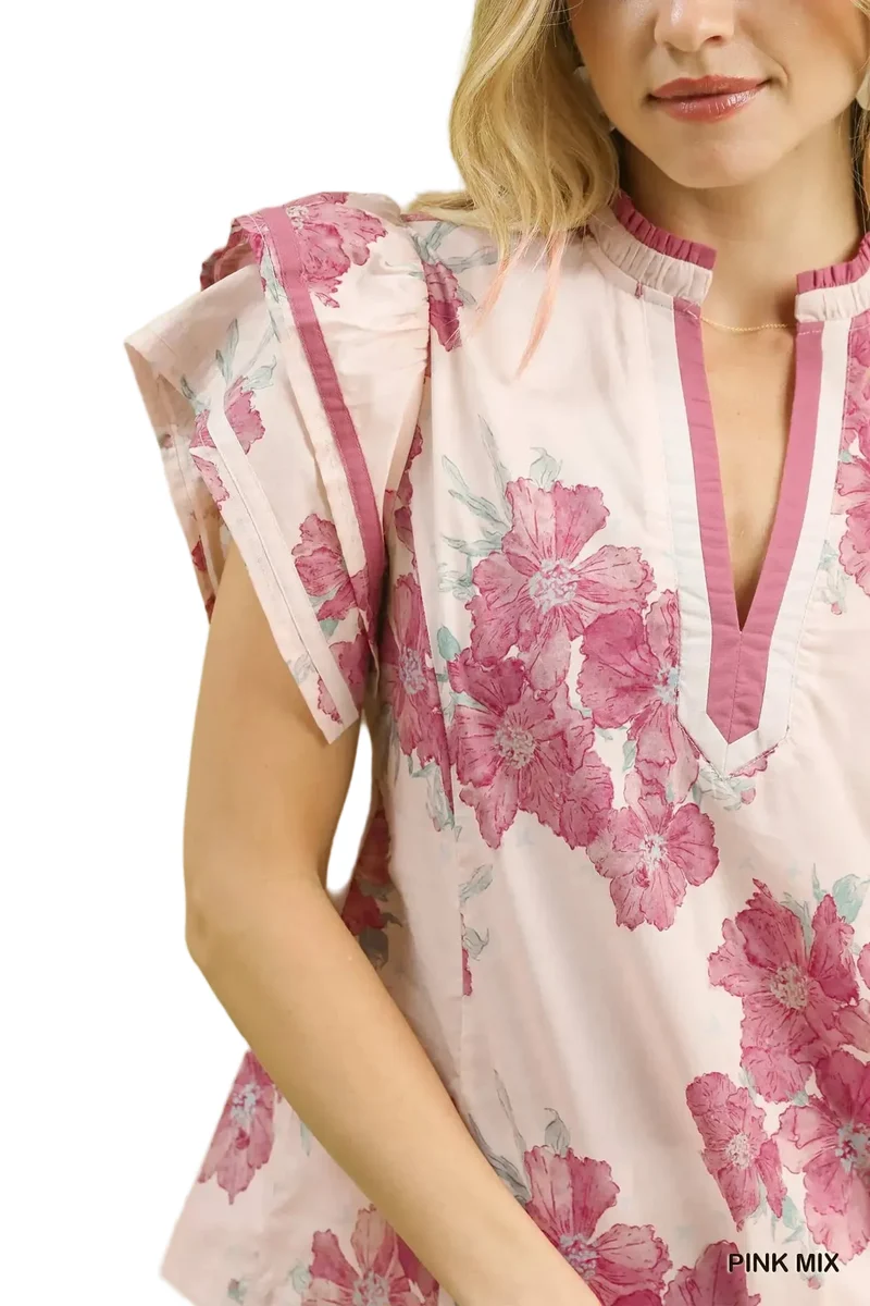 Elegante blouse met bloemenprint, ruches, een splitkraag en dubbele wijdvallende mouwen.