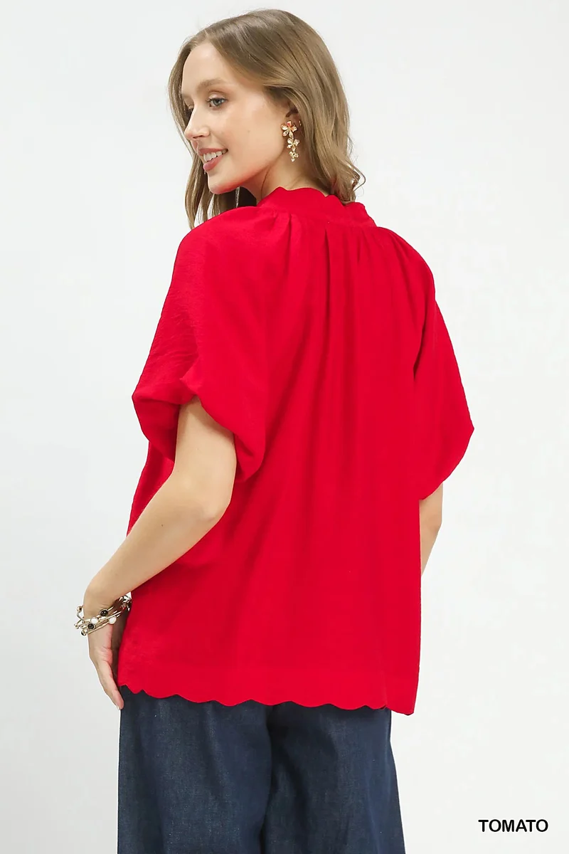 Blouse met geborduurde bloemen aan de zoom