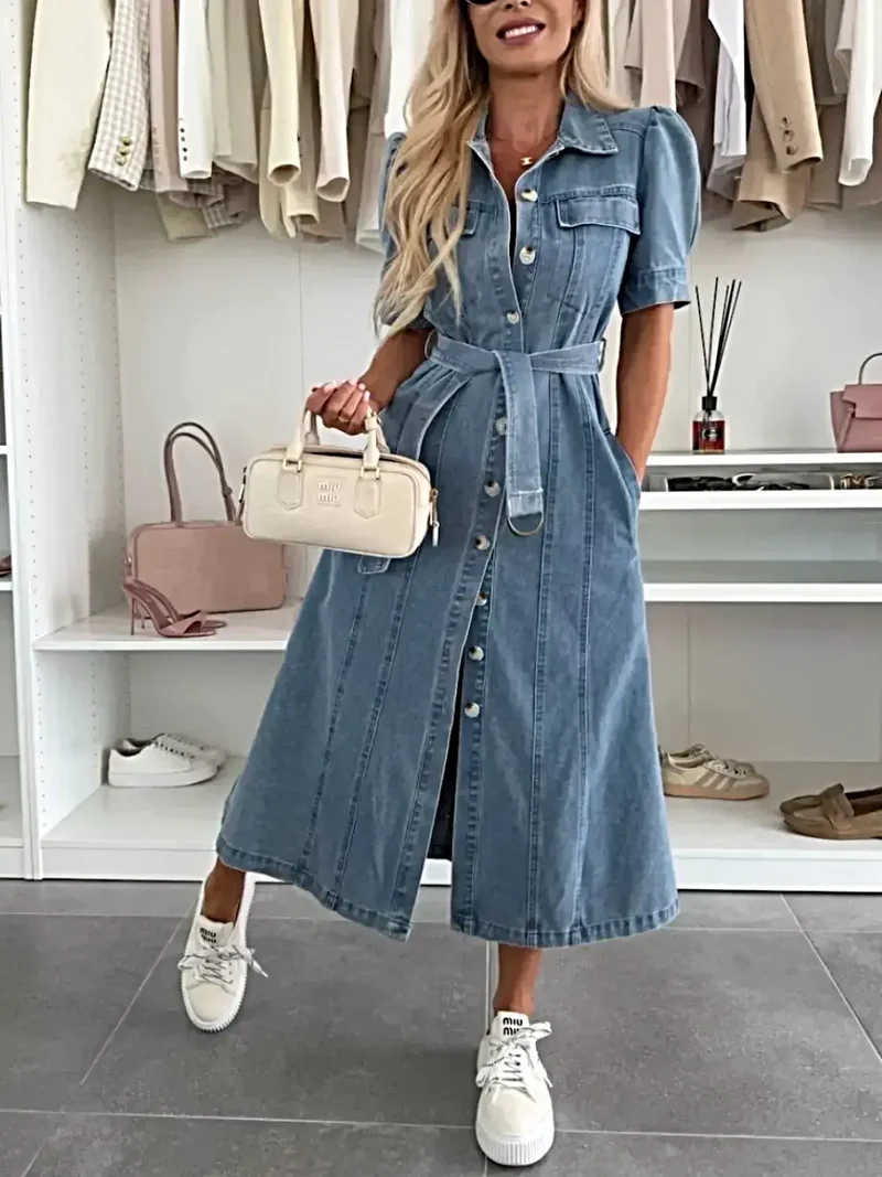 Elegante midi-jurk van denim met pofmouwen, knoopsluiting, ceintuur en zakken.
