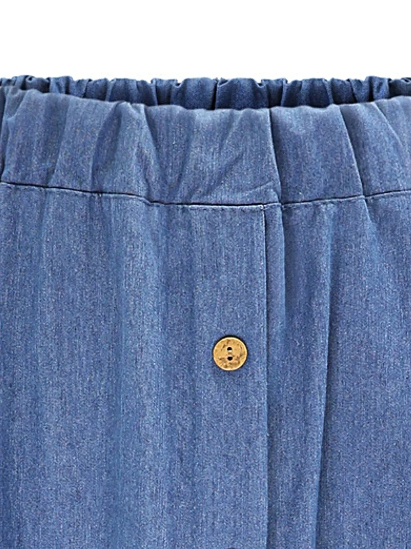 A-lijn rok met knoopsluiting aan de voorkant en zakken, 100% polyester, stijlvol en comfortabel.