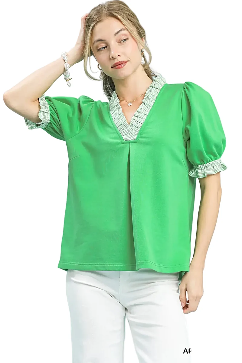 Elegante blouse met pofmouwen en ruches, gemaakt van zachte Franse badstof.