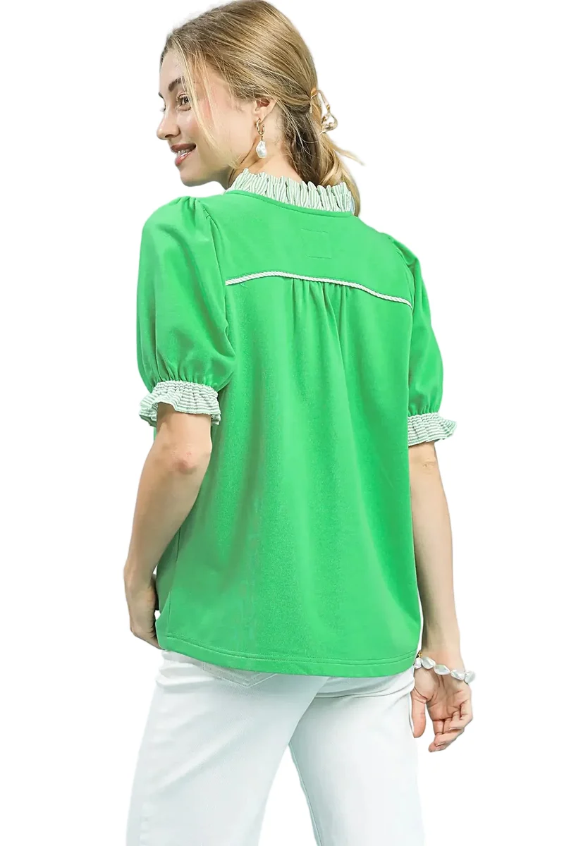 Elegante blouse met pofmouwen en ruches, gemaakt van zachte Franse badstof.