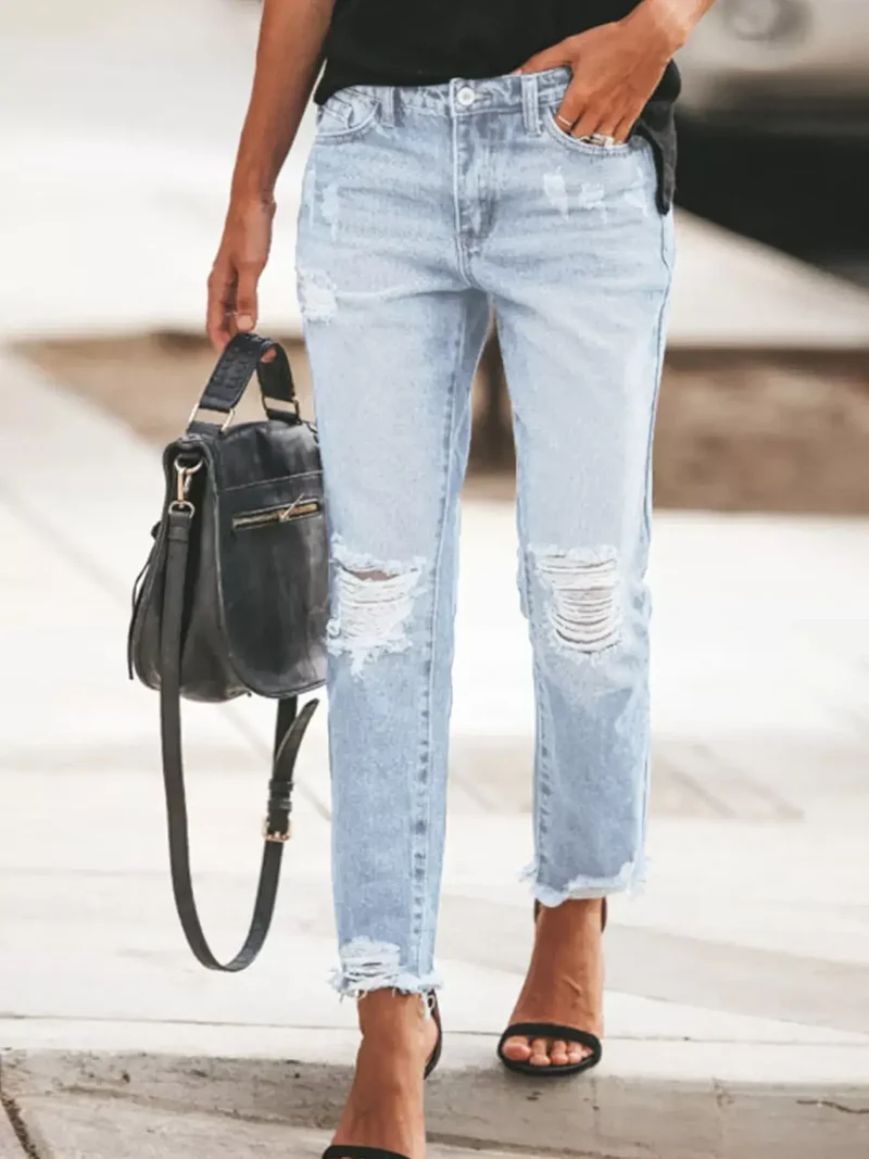 Geef je stijl een boost met deze jeans met verwassen look en rafelige zoom - 85% katoenmix