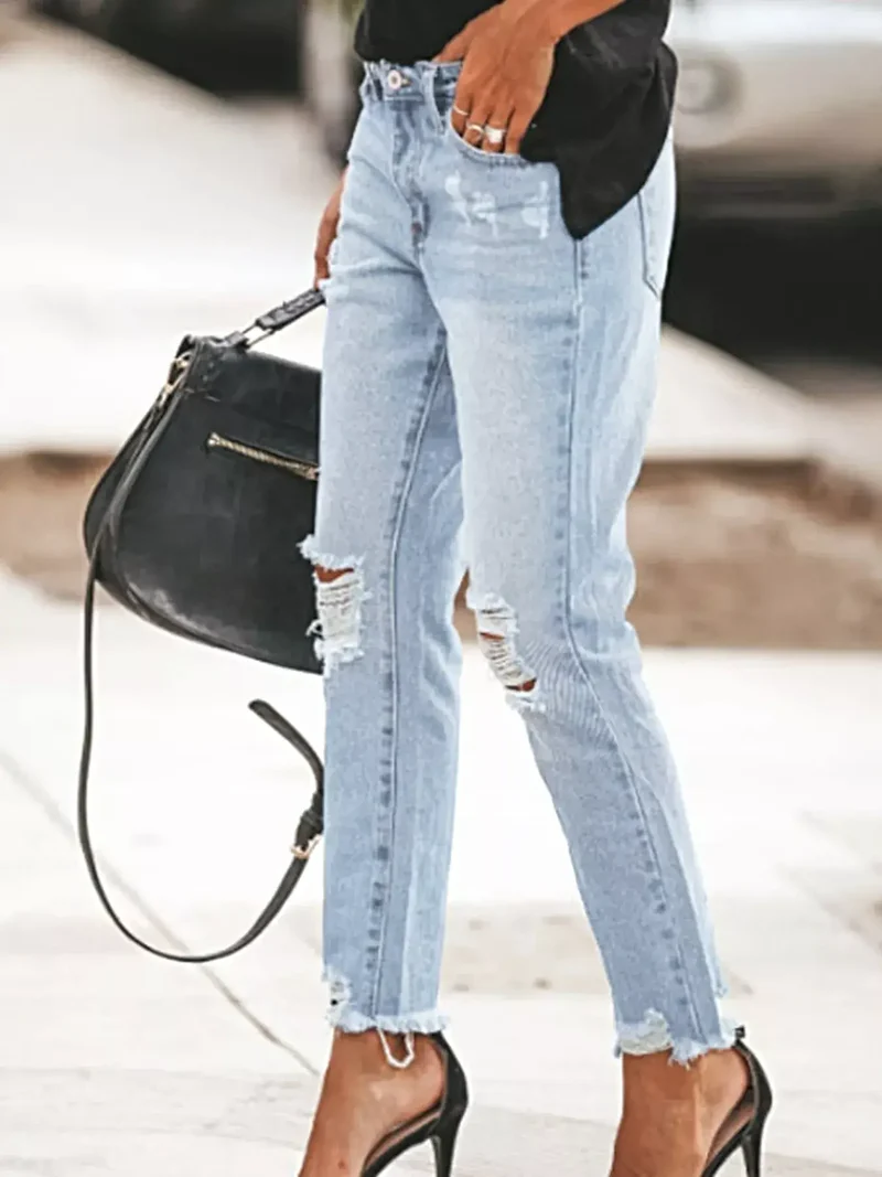 Geef je stijl een boost met deze jeans met verwassen look en rafelige zoom - 85% katoenmix
