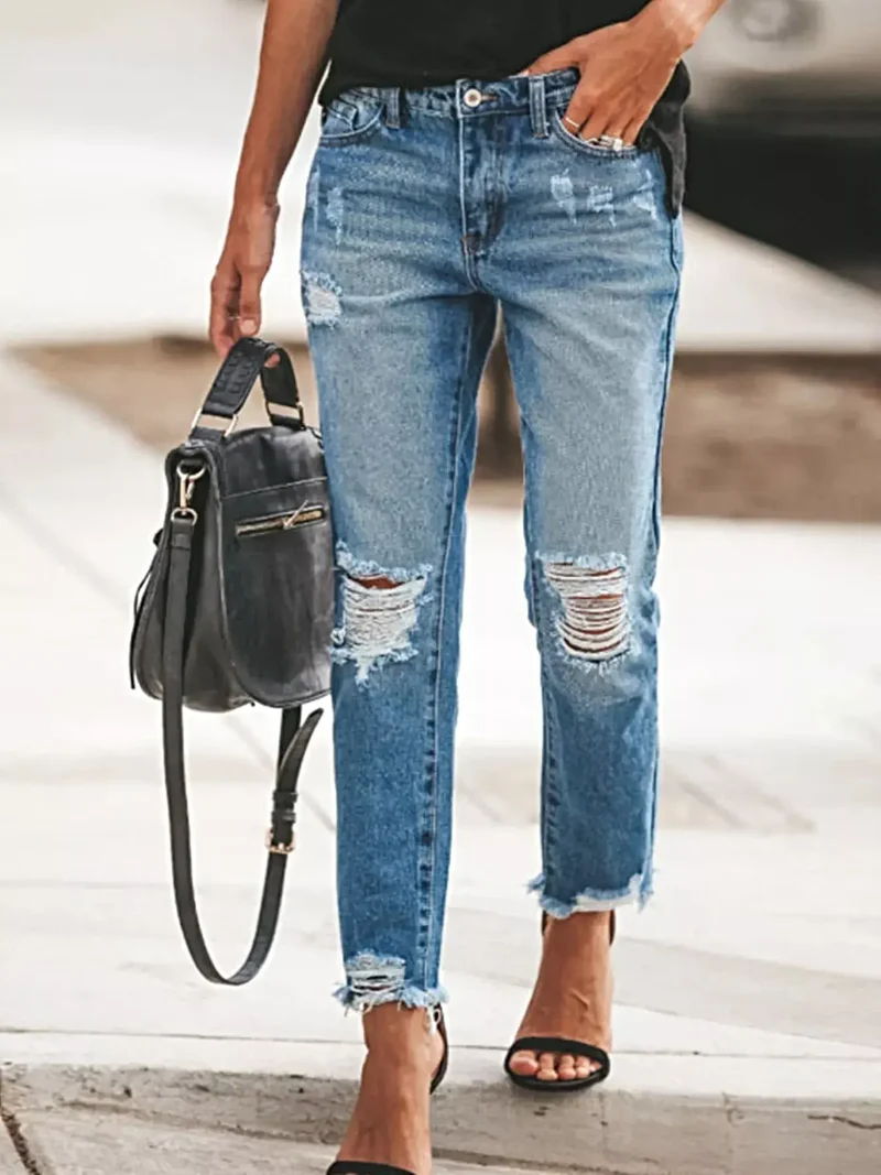 Geef je stijl een boost met deze jeans met verwassen look en rafelige zoom - 85% katoenmix