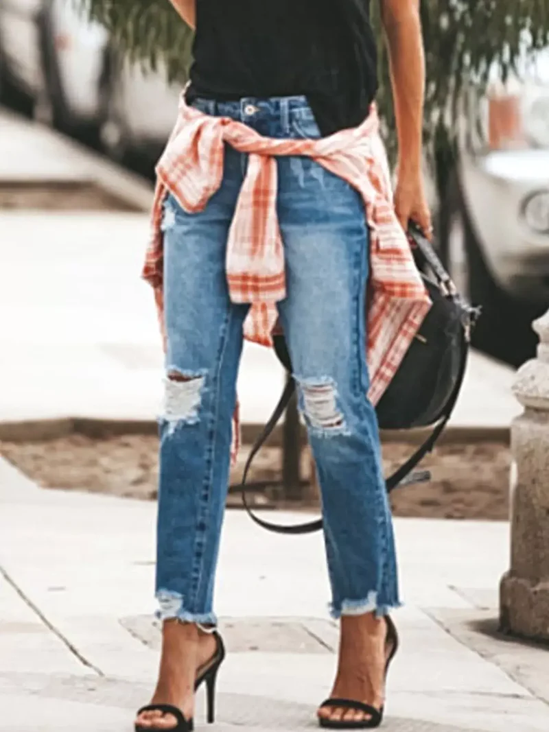 Geef je stijl een boost met deze jeans met verwassen look en rafelige zoom - 85% katoenmix