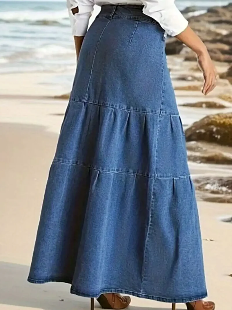 Luxe maxi-rok van denim met meerdere lagen, ritssluiting en plooien.