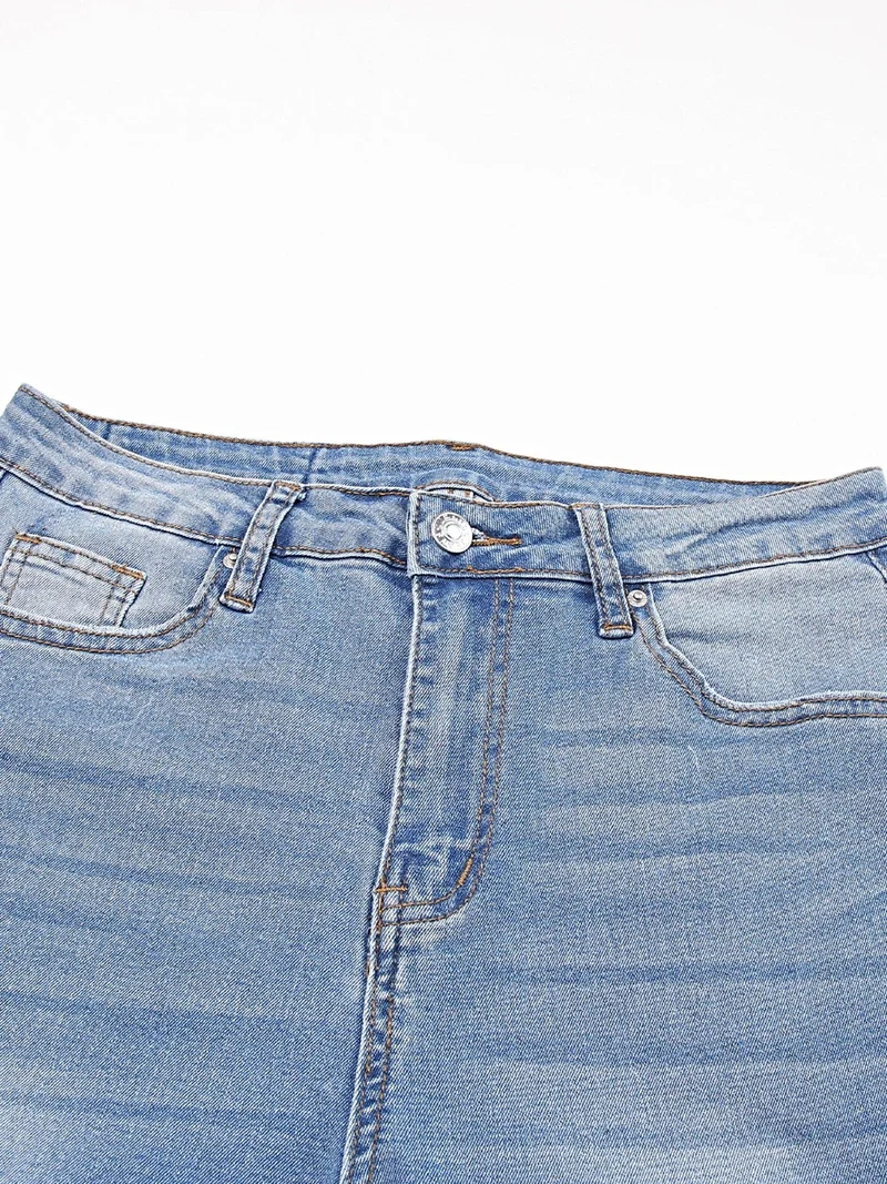 Elegante cropped jeans met onafgewerkte zoom voor dames – licht elastisch en gemaakt van een hoogwaardige katoenmix.