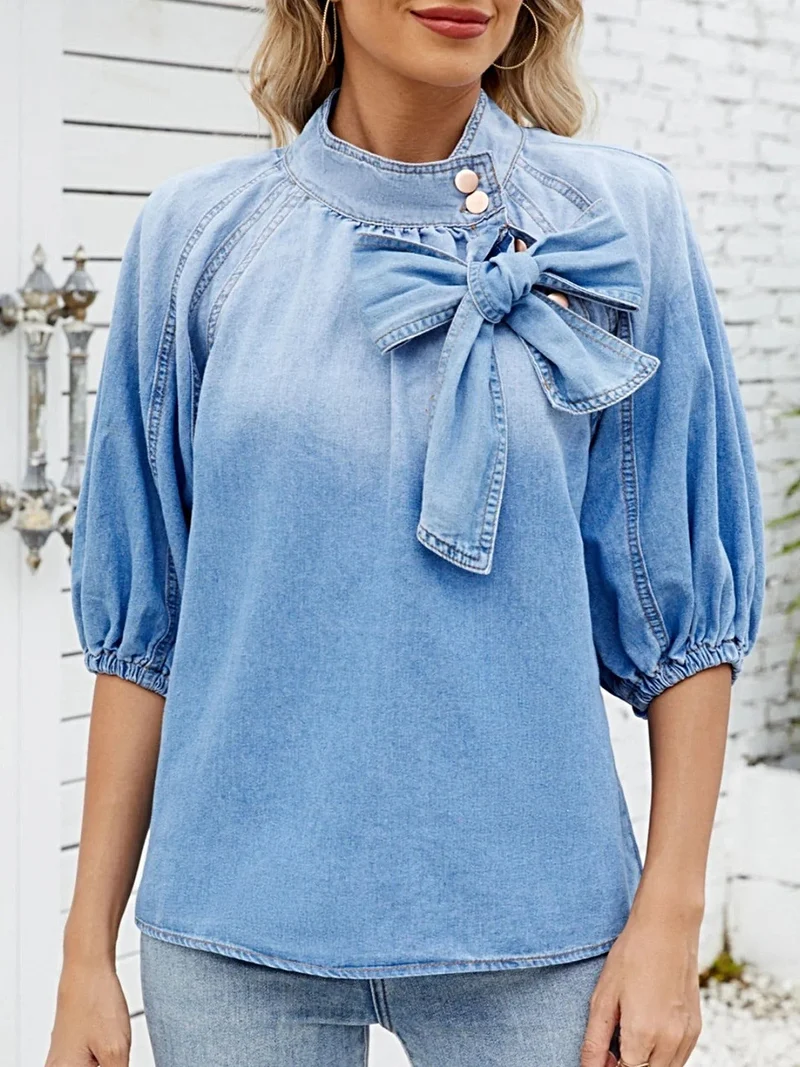 Stijlvol denim overhemd met strik en pofmouwen - elegante damestop van een rayonmix