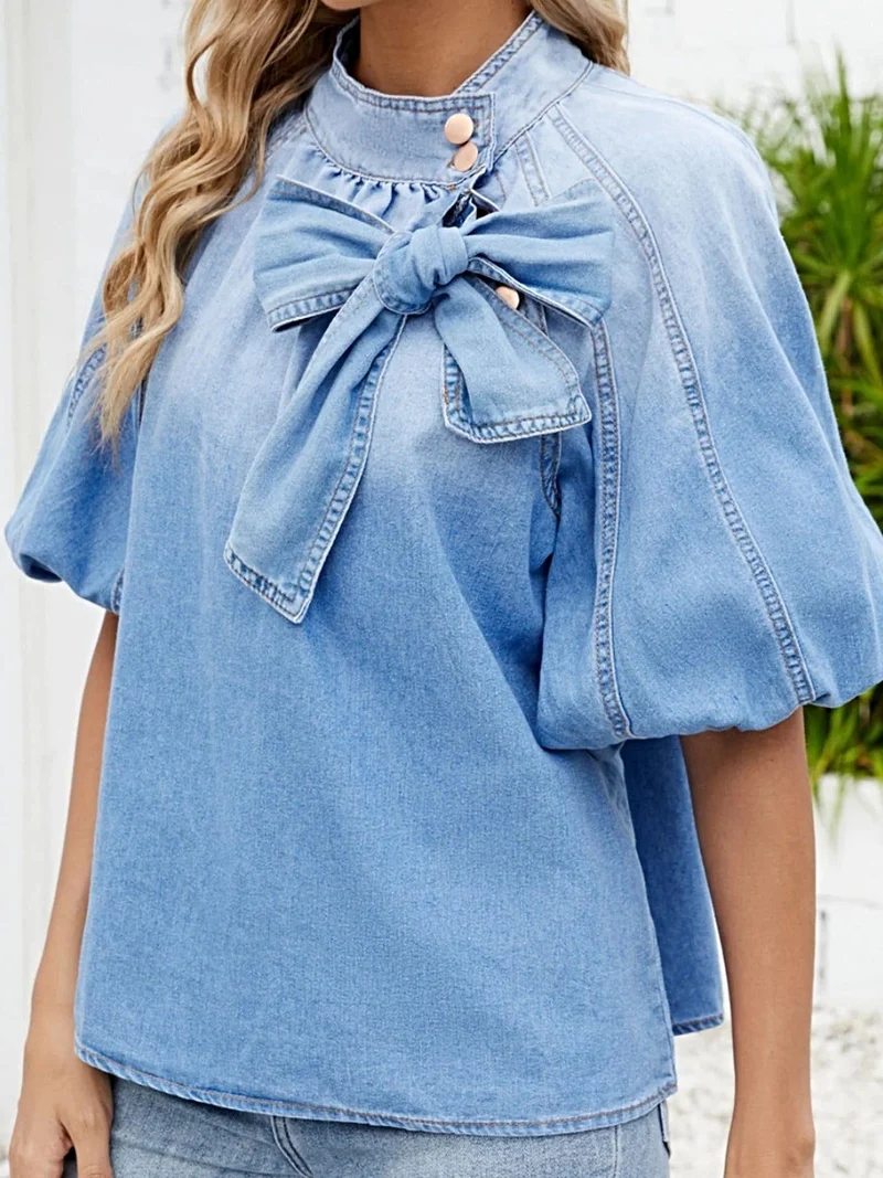 Stijlvol denim overhemd met strik en pofmouwen - elegante damestop van een rayonmix