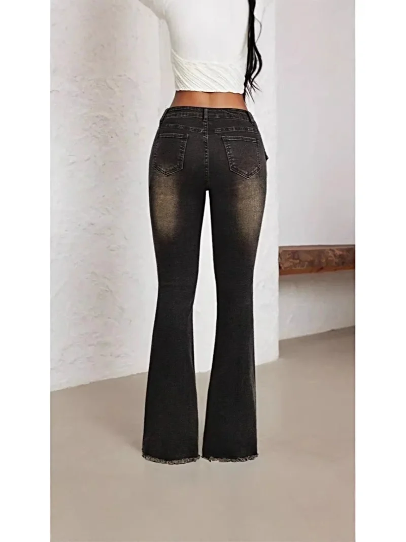 Chique flared jeans met riem, hoge taille en distressed details voor stijlvolle outfits