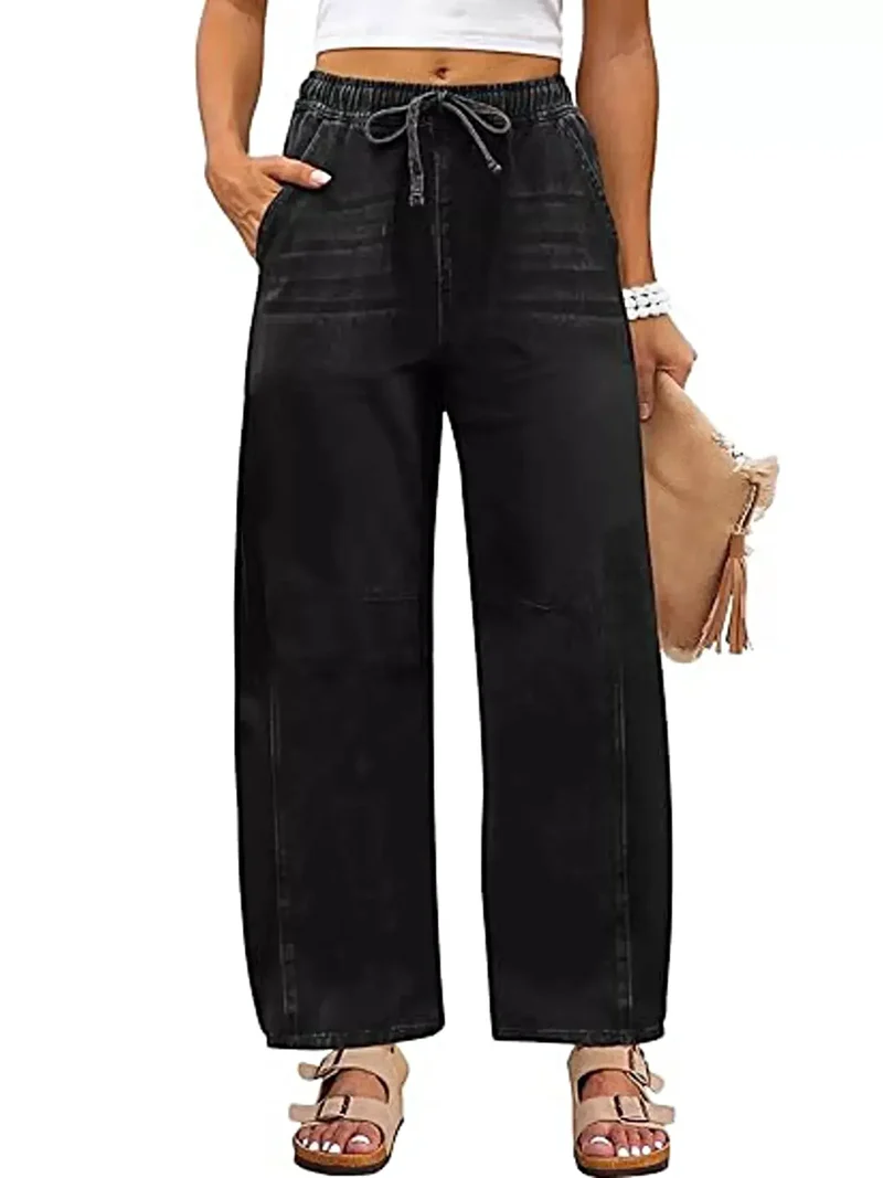 Luxe jeans met elastische tailleband, wijde pijpen, trekkoord en zakken.