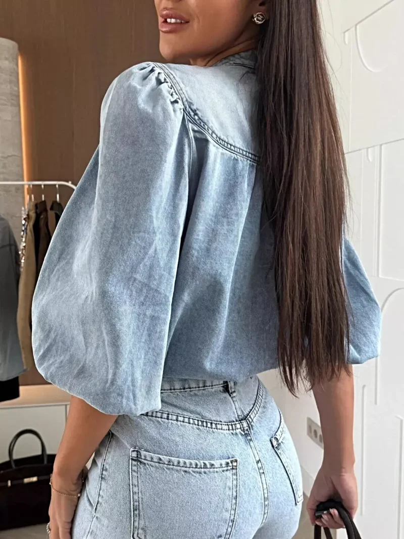 Luxe denim top met pofmouwen en knoopsluiting | 65% katoenmix voor extra comfort