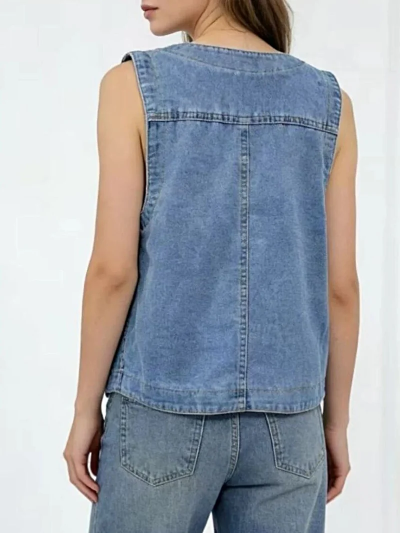 Elegant denim vest met knoopsluiting en zakken voor dames in grote maten - gemaakt van een katoenmix.