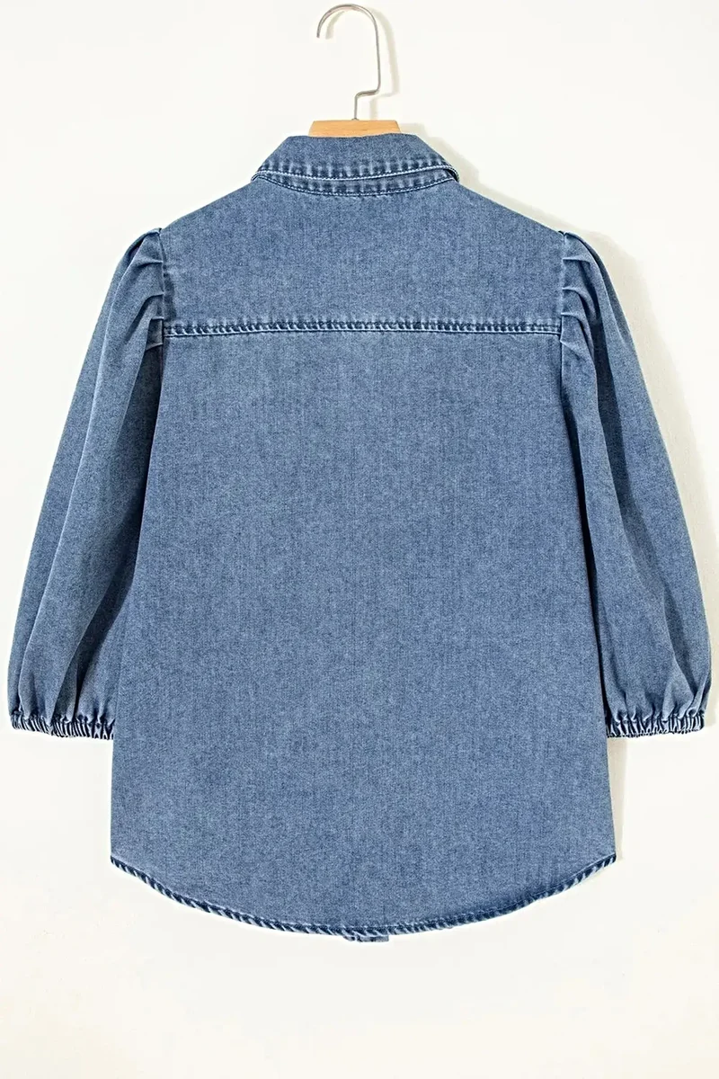 Trendy elegante denim blouse met pofmouwen - 82% katoen, knoopsluiting voor een chique look.