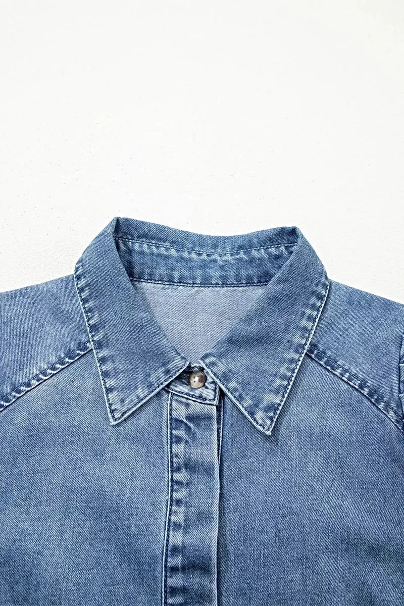 Trendy elegante denim blouse met pofmouwen - 82% katoen, knoopsluiting voor een chique look.