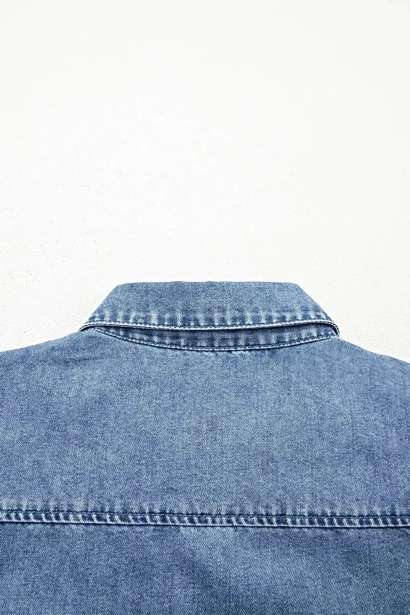 Trendy elegante denim blouse met pofmouwen - 82% katoen, knoopsluiting voor een chique look.