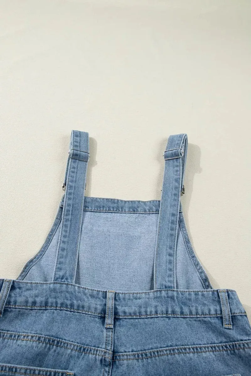 Elegante retro jumpsuit met zakken en geplooide wijde pijpen - Chique denim mode voor dames