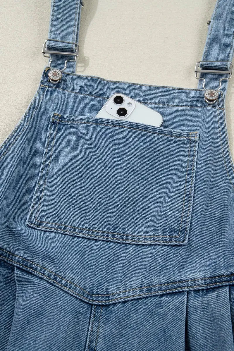 Elegante retro jumpsuit met zakken en geplooide wijde pijpen - Chique denim mode voor dames