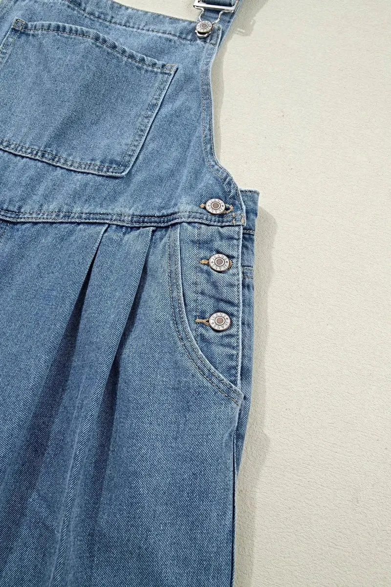 Elegante retro jumpsuit met zakken en geplooide wijde pijpen - Chique denim mode voor dames