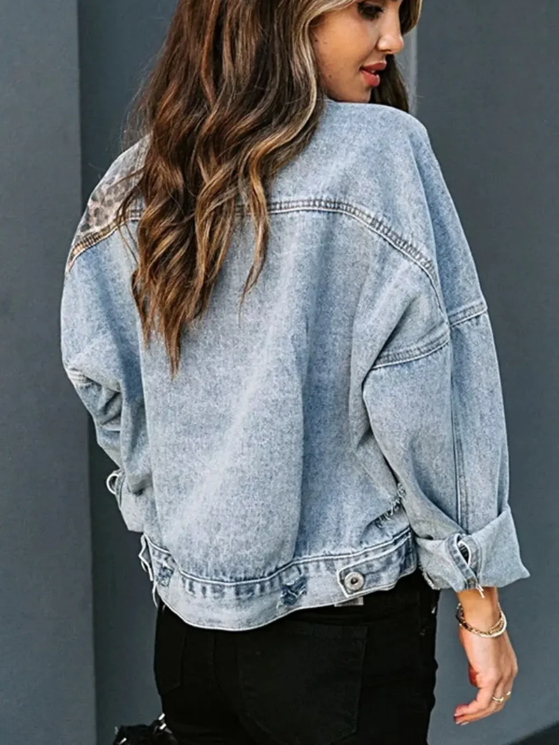 Chique spijkerjas met luipaardprint en zakken met knoopsluiting - perfect voor stijlvolle outfits