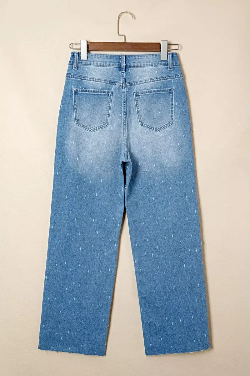 Stijlvolle jeans met een verwassen look, buikcorrigerend effect, rafelige zoom en functionele zakken.
